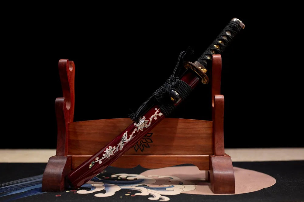 Flat fully‑drawn T10 clay‑tempered suji‑gunome‑hamon Tsurumaru‑Wakizashi blade wooden rack front shot
