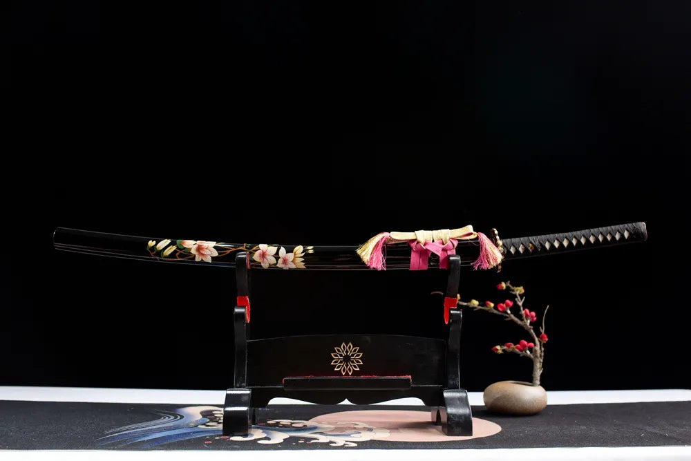 Horizontal laid closed pink dactylicapnos vine lacquer samurai sword