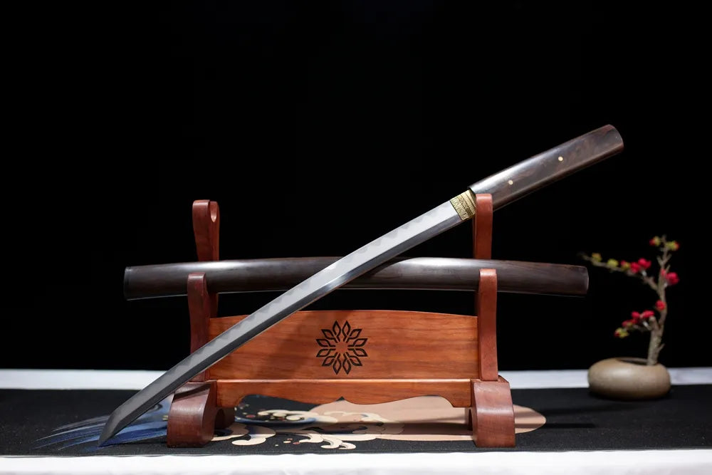 Slanted upright drawn Night‑Elf‑Wakizashi dark‑lore‑fantasy wakizashi wooden shelf front perspective