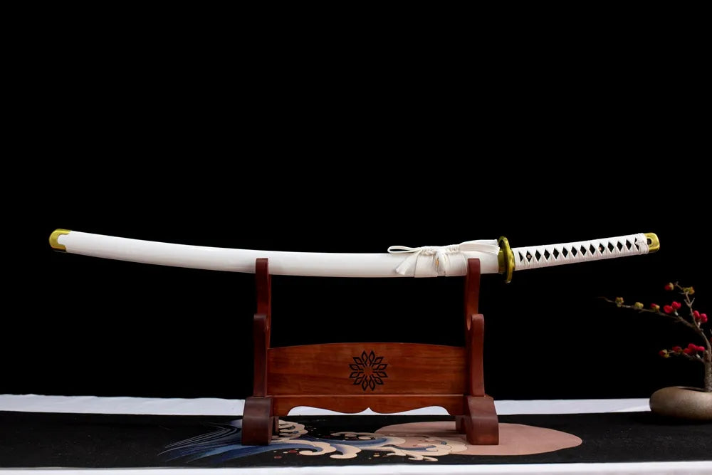 Horizontal laid closed off‑white sakura print Wado Ichimonji scabbard display