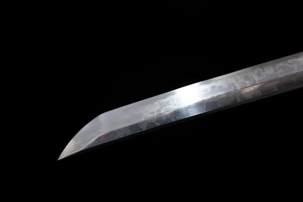 Midarekomi‑style kissaki tip of Dragon‑King‑Katana blade close‑up view