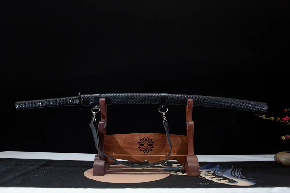 Unsheathed Obsidian horizontal shot full matte black T10 plain maru blade