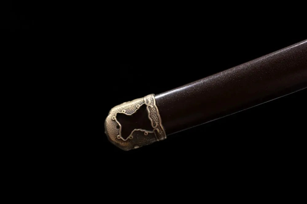 Bottom dark‑brown vintage saya brass military‑spec kojiri end‑cap close‑up