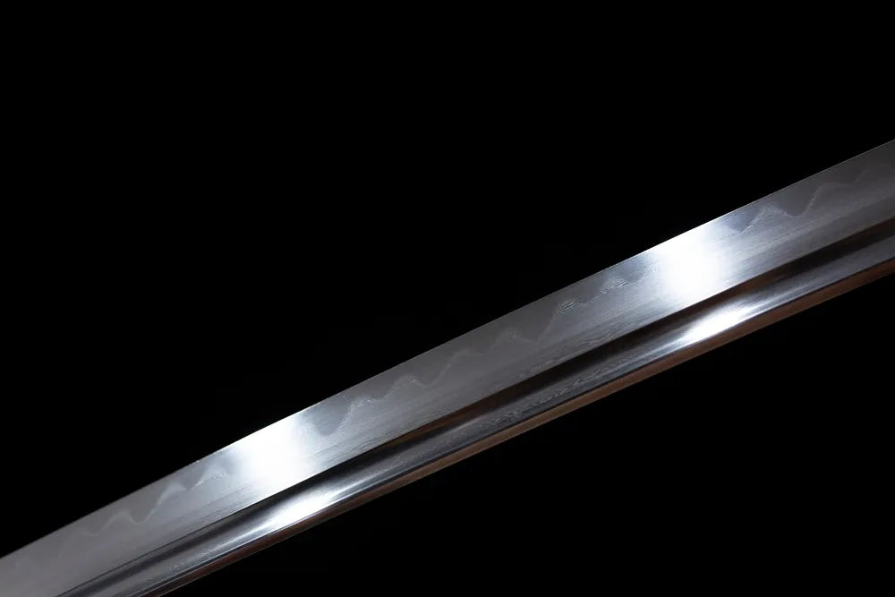 Mid‑section clean suguha plain‑straight‑pattern hamon steel katana blade surface close‑up shot