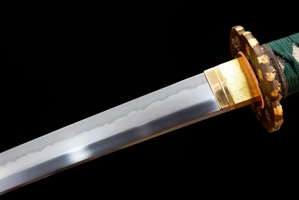 Upper T10 clay‑tempered katana blade brass habaki midare‑gunome layered‑maple‑undulating hamon temper‑line macro close‑up