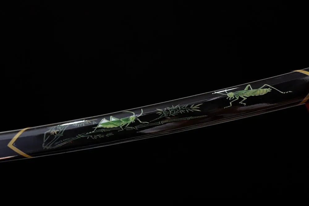 Mid‑section moss‑green lacquer hardwood katana saya hand‑painted grass‑leaf‑grasshopper wild‑nature graphic texture close‑up