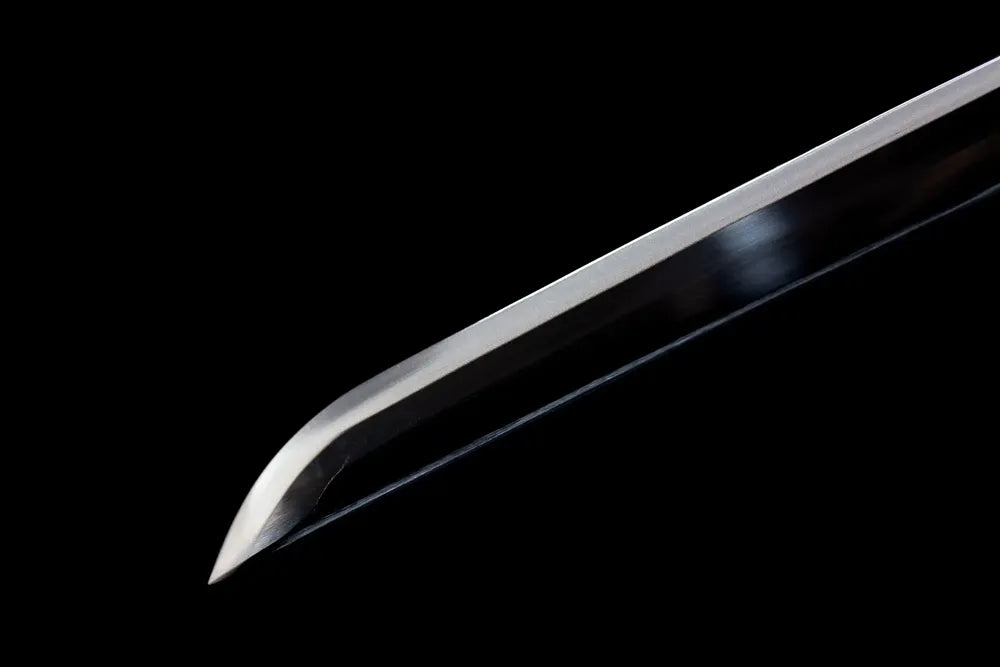 Kissaki tip of Kamado Tanjirou black nichirin blade front close‑up view