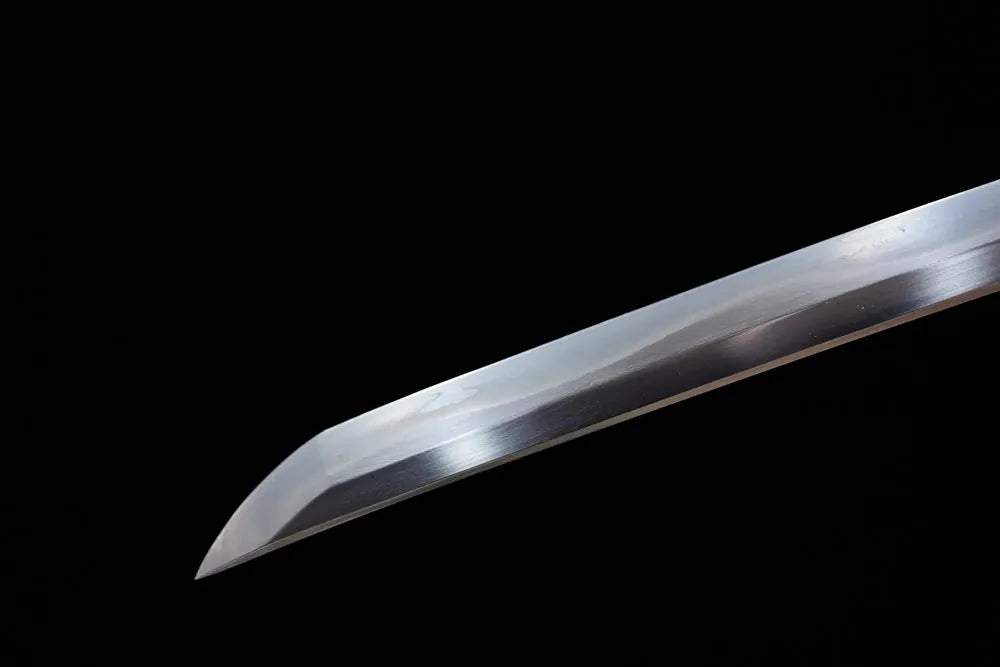 Classic functional katana‑style kissaki tip of Nine‑Heavenly‑Dragons‑Katana blade close‑up view