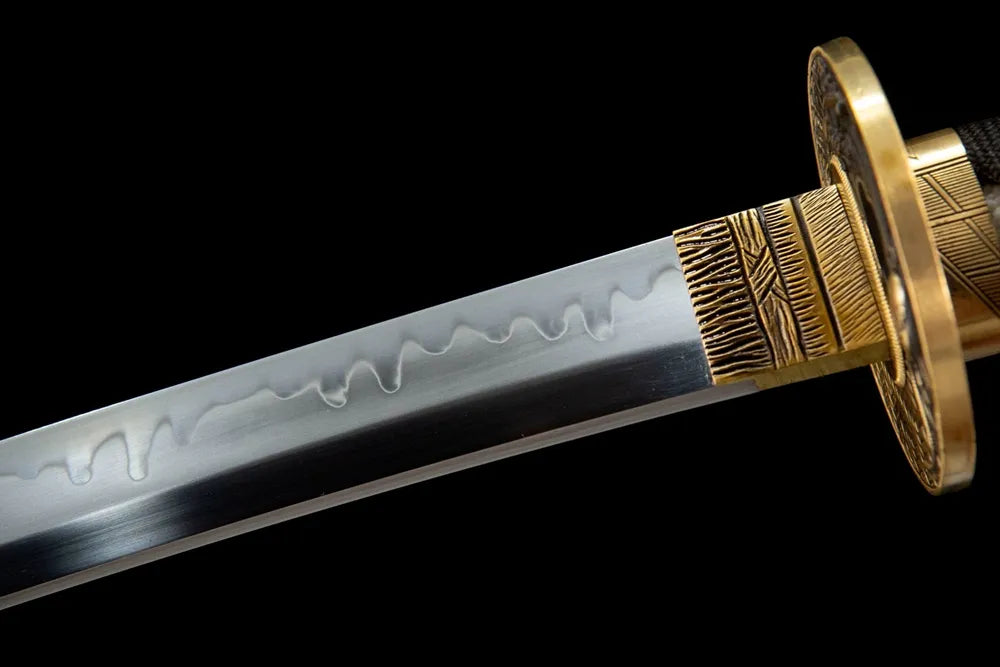 Upper blade closeup neat gunome wave hamon near solid copper habaki