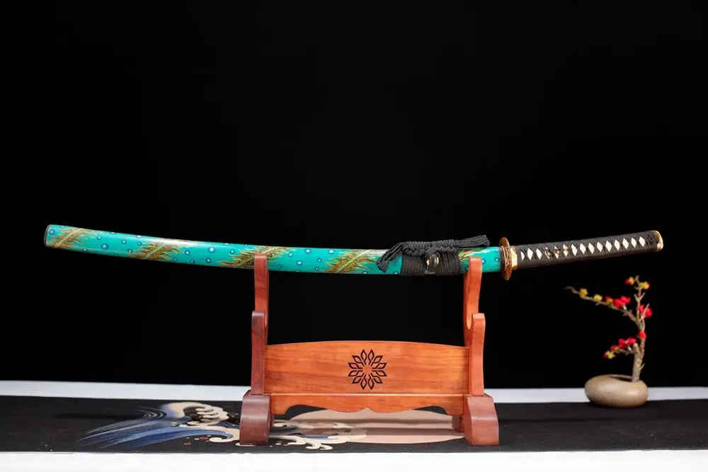 Horizontal laid closed turquoise‑blue hand‑painted peacock‑tail‑plume Blue‑Peafowl‑Katana scabbard flat table‑top front display