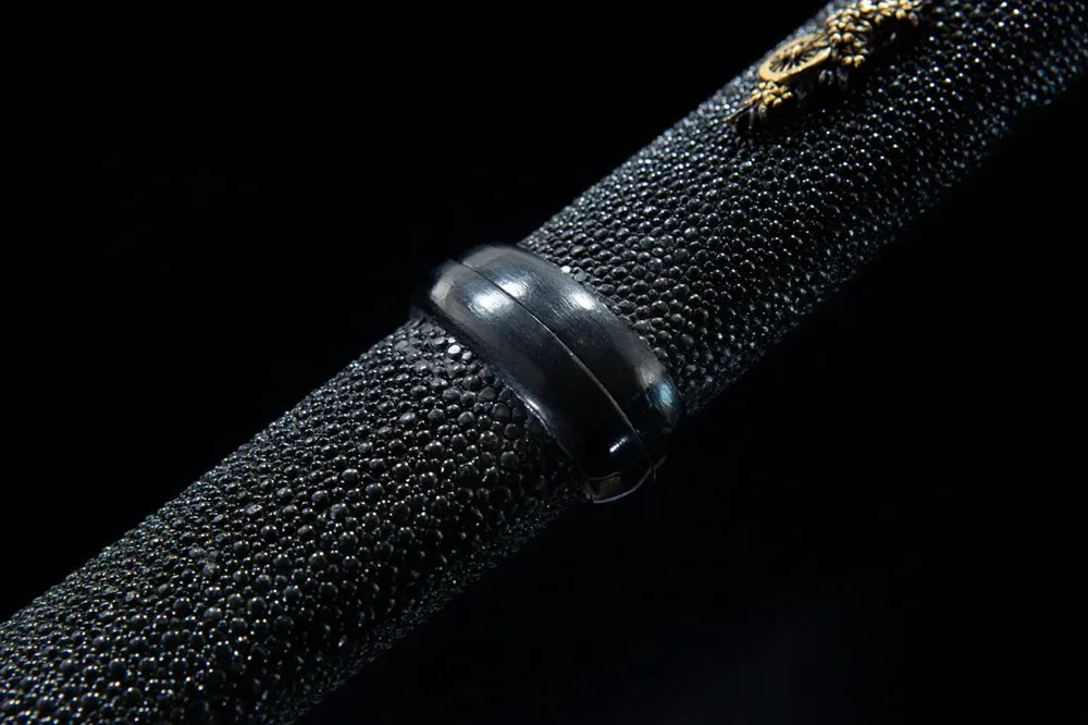 Detail of the horn on the scabbard edge