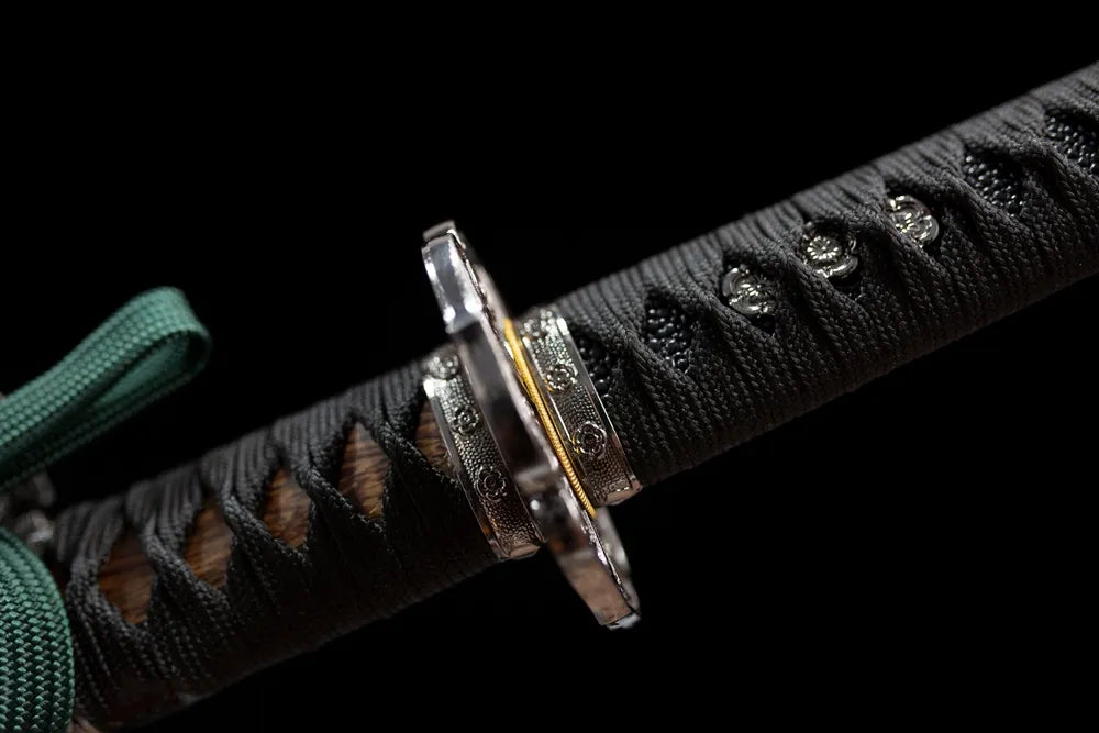 Night‑eagle‑raptor‑relief brass‑alloy fuchi grip‑ring macro close‑up