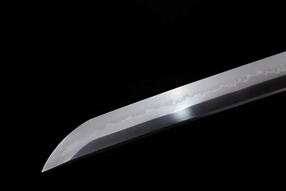 Classic functional katana‑style kissaki tip of Sakura‑Katana blade close‑up view