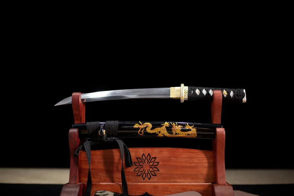 Flat fully‑drawn T10 clay‑tempered wavy‑hamon Dragon‑Wakizashi blade wooden rack front shot