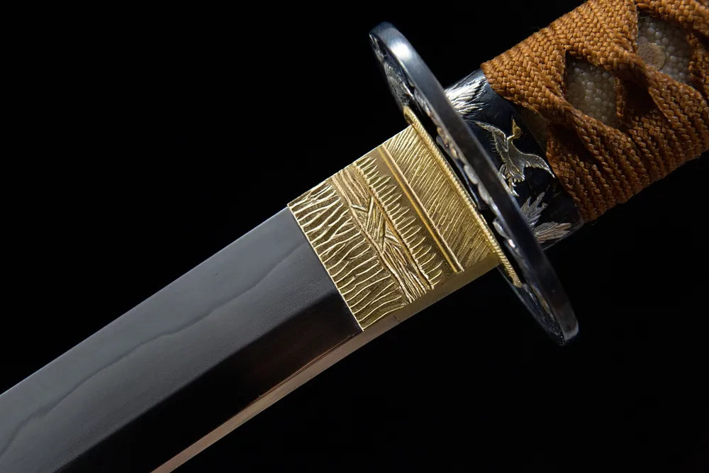 Upper blade closeup neat notare wave hamon near copper habaki real yokote boundary