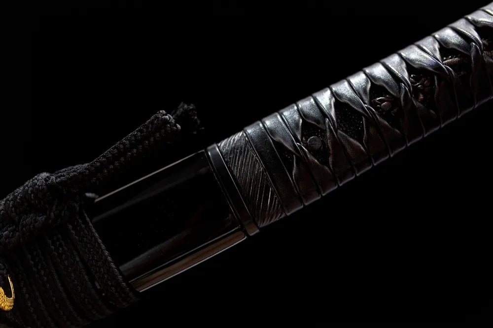 Mini matte black dragon grip ring macro view