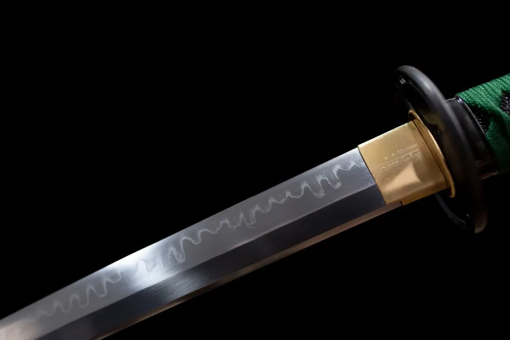Upper T10 clay‑tempered katana blade brass habaki composite mixed‑style hamon temper‑line macro close‑up