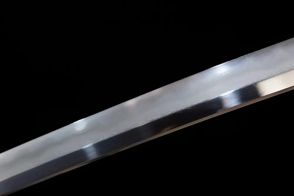 Mid‑section midare‑gunome tiger‑mane‑undulating‑pattern hamon steel katana blade surface close‑up shot