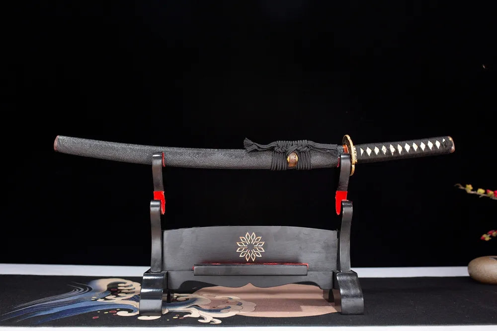 Horizontal laid closed solid‑wood wrapped‑real‑fish‑skin Black‑Knight‑Wakizashi scabbard flat table‑top front display
