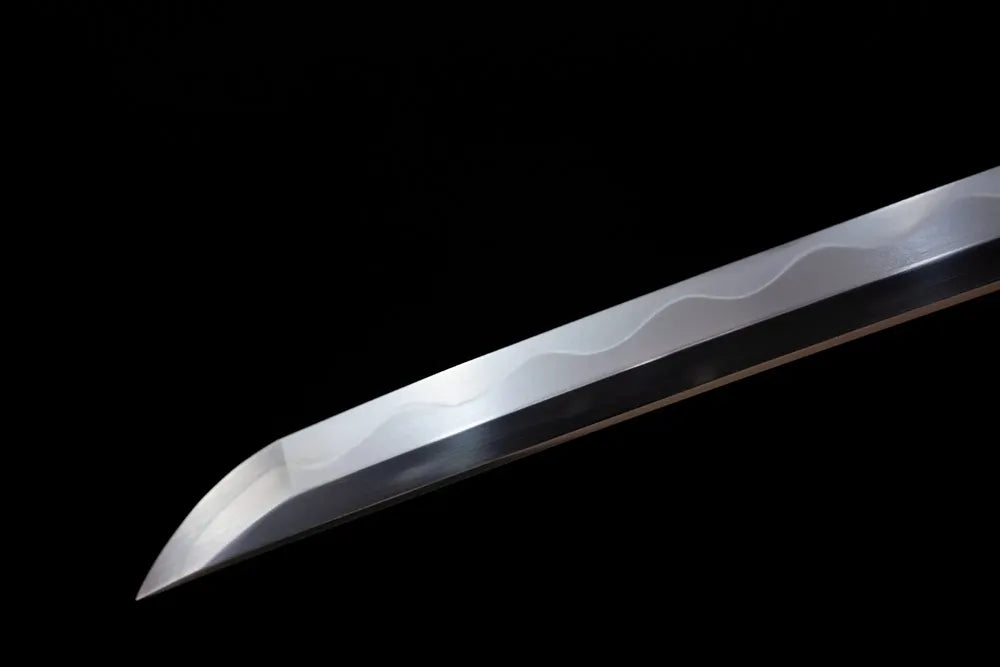 Elegant aristocratic‑style tachi‑kissaki tip of Royal‑Chrysanthemum‑Tachi blade close‑up view