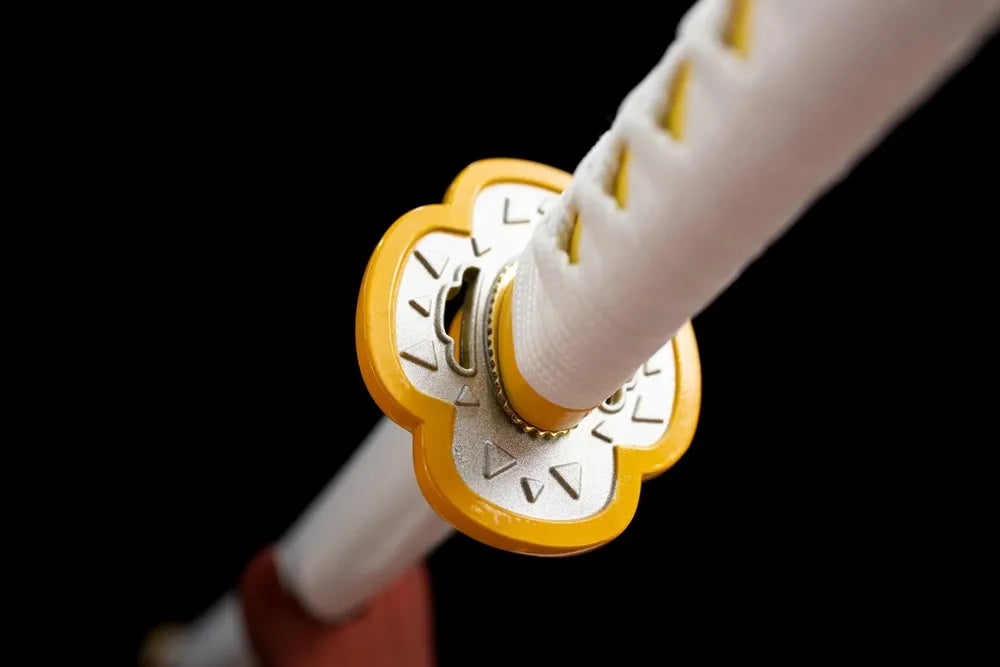 Reverse flower‑outline golden‑trim zinc‑alloy tsuba surface texture