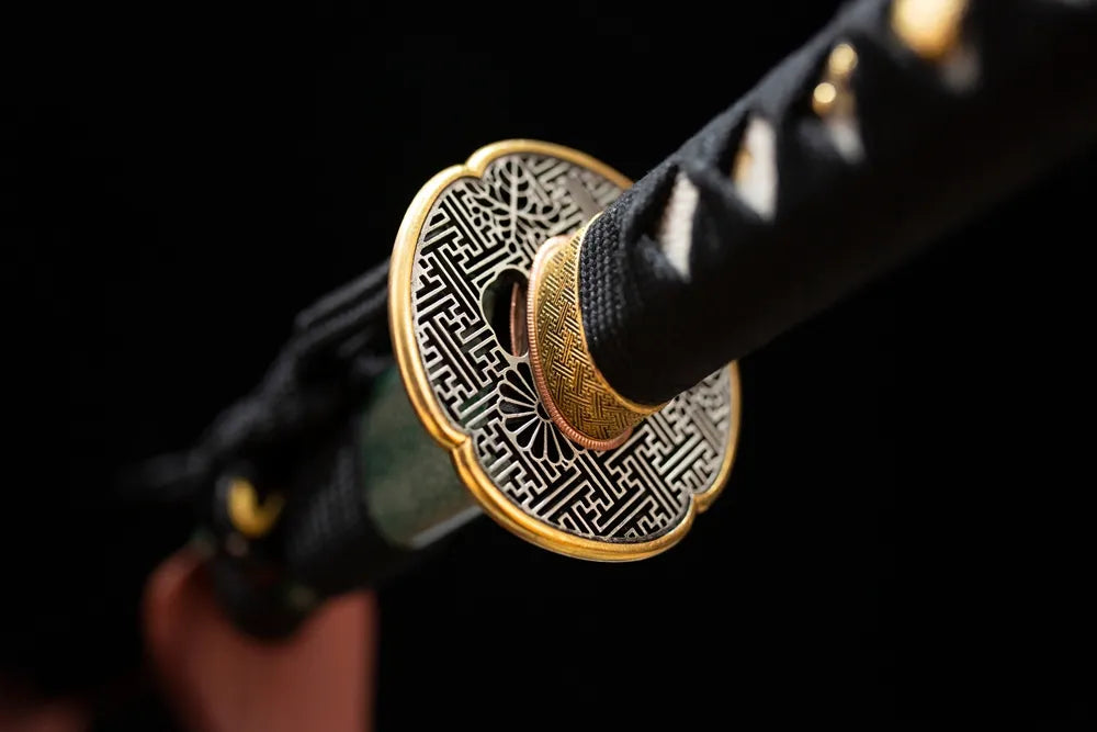 Reverse‑side floral‑carving copper gilded‑silver tsuba surface texture close‑up