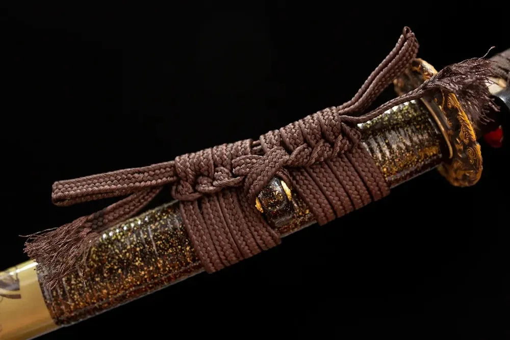 Thick smoky‑grey‑black heavy‑braided sageo cord dark‑aged‑bronze fitting macro close‑up