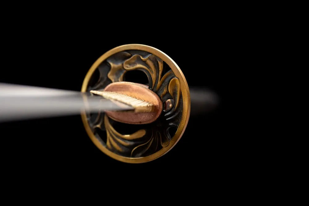 Front hollow‑open‑work yoshino‑sakura brass‑alloy samurai hand‑guard close‑up