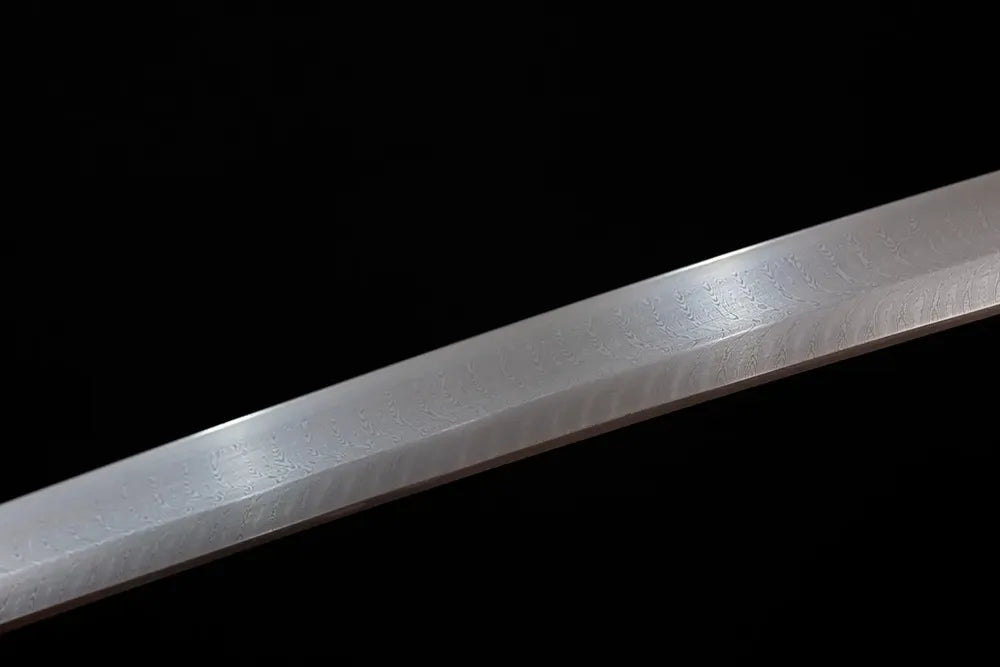 Mid‑section billowing cloud‑surge undulating‑pattern hamon steel katana blade surface close‑up shot