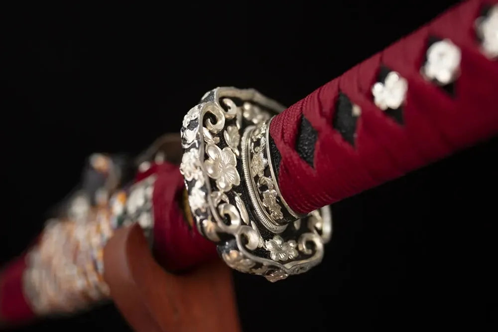 Reverse‑side plum‑blossom‑scroll carving pure‑copper tsuba surface texture close‑up