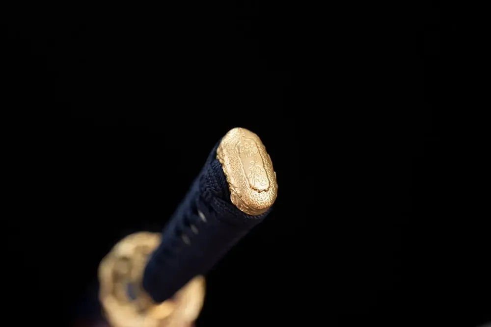 3D‑sculpted mirror‑heart‑oni‑phantom‑demon gilded‑copper pommel‑cap detail shot‑wakizashi