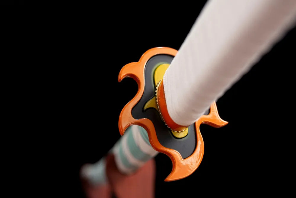 Reverse flame‑outline alloy tsuba surface texture