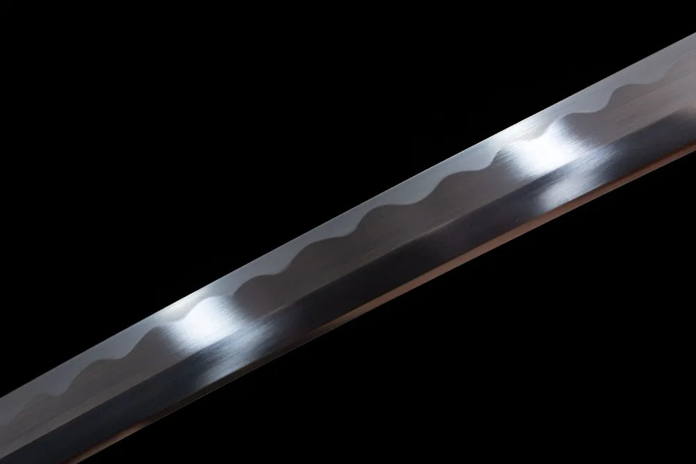 Mid smooth notare steel wave texture saya metal fitting macro shot