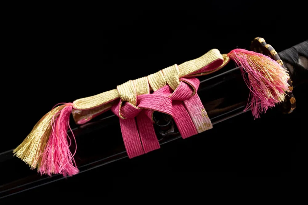 Pink gold double tassel braided sage cord close-up