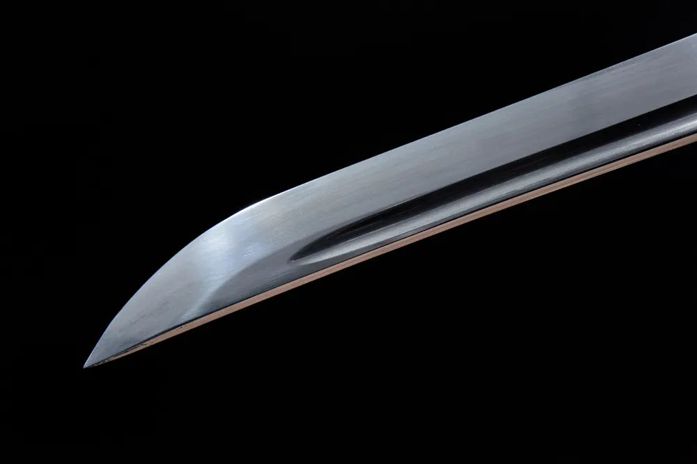 Kissaki tip closeup ultra smooth mirror polished sharp long tachi edge