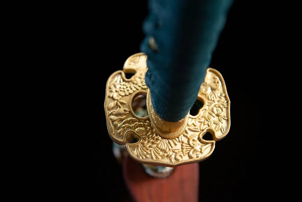Reverse carved floral golden alloy tsuba