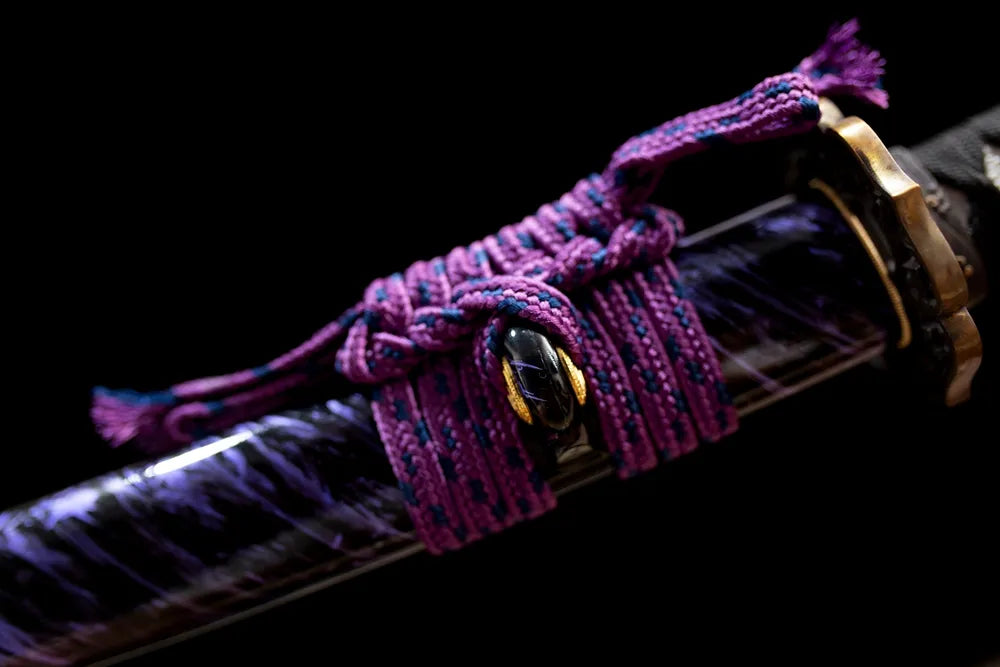 Thick purple‑blue mixed braided sageo cord antique‑bronze fitting macro close‑up