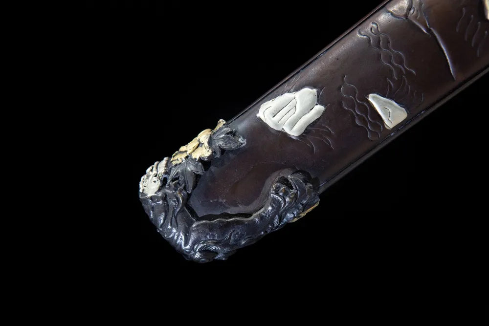 Bottom beast carving saya end cap