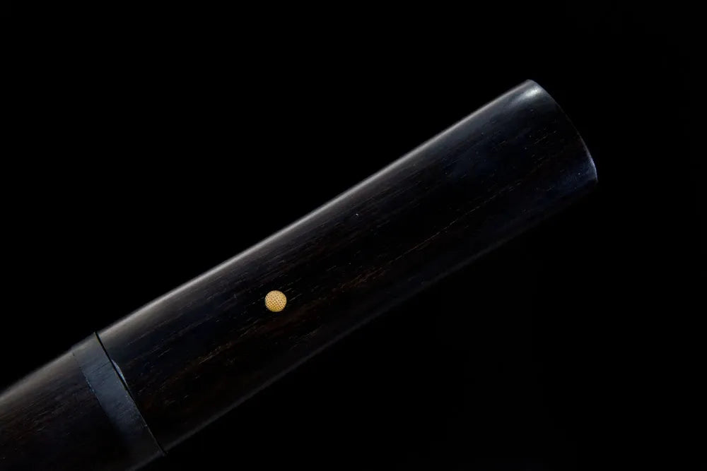 Full carved grip front shot