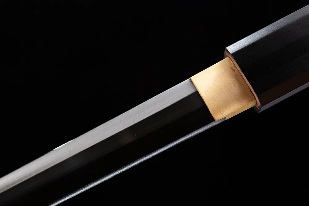 Upper plain T10 blade + solid brass habaki close-up