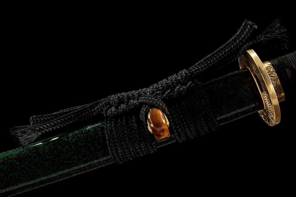 Coarse cotton sageo cord tied on ox horn saya ring