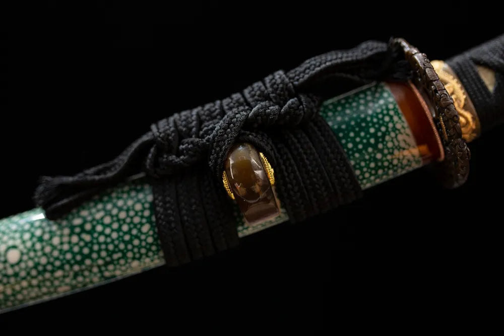 Thick forest‑green braided sageo cord green‑aged alloy fitting macro close‑up