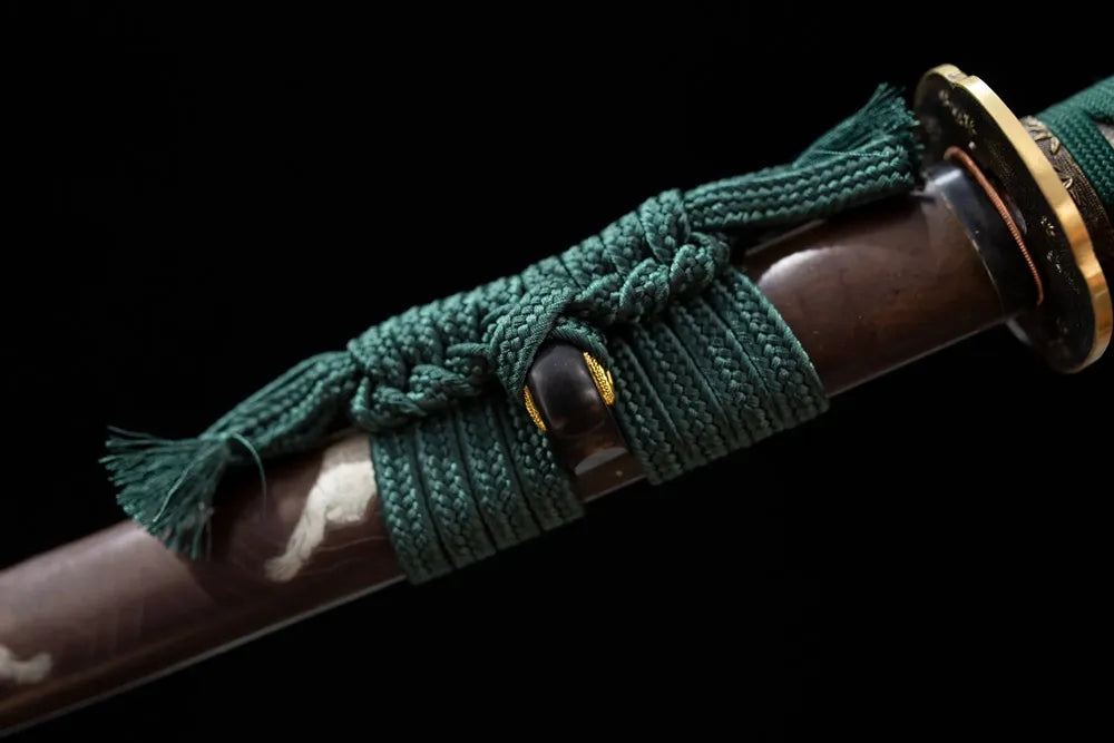Thick deep‑green heavy‑braided sageo cord vintage‑brass fitting macro close‑up