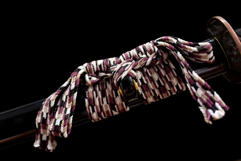 Solid black braided sageo cord matte‑black alloy fitting macro close‑up