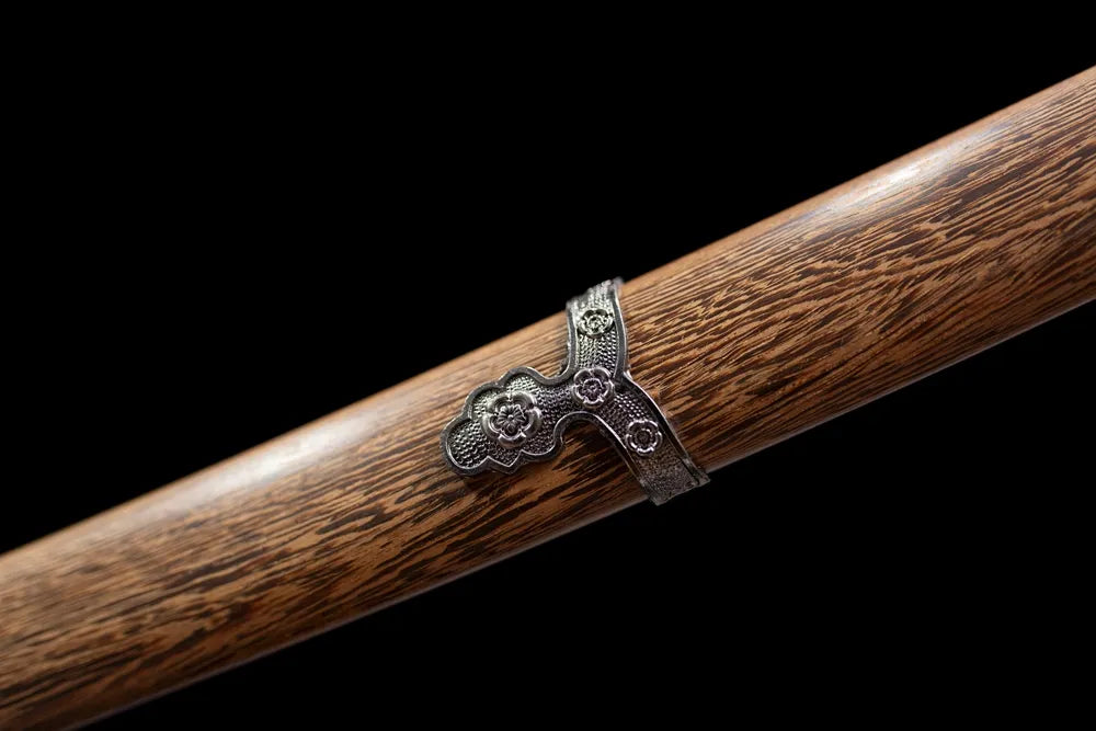 Mid‑section vintage brown wood‑grain lacquer hardwood tachi saya texture close‑up