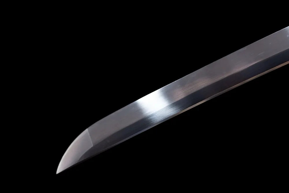 Extended polished tachi‑style kissaki tip of Imperial‑Family‑Tachi blade close‑up view