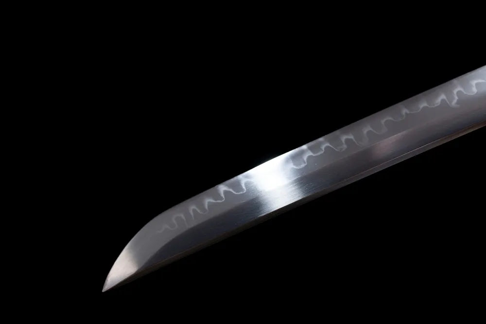 Classic functional katana‑style kissaki tip of Green‑Python‑Katana blade close‑up view