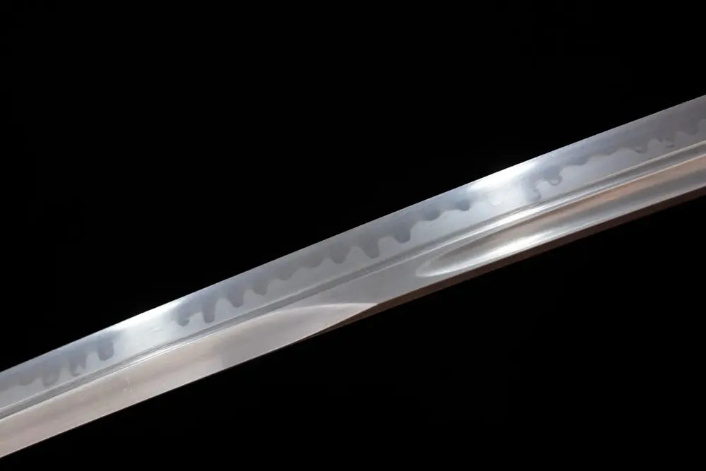 Mid‑section sanbonsugi three‑cedar‑tree‑pattern hamon steel katana blade surface close‑up shot