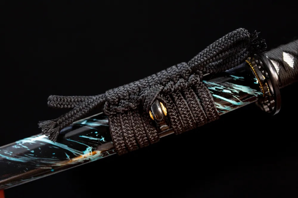 Thick black heavy‑braided sageo cord black‑alloy fitting macro close‑up