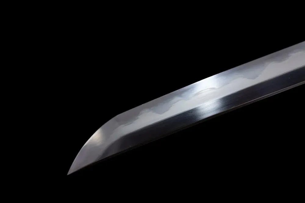 Extended functional historical tachi‑style kissaki tip of Black‑Tachi‑Sword blade close‑up view